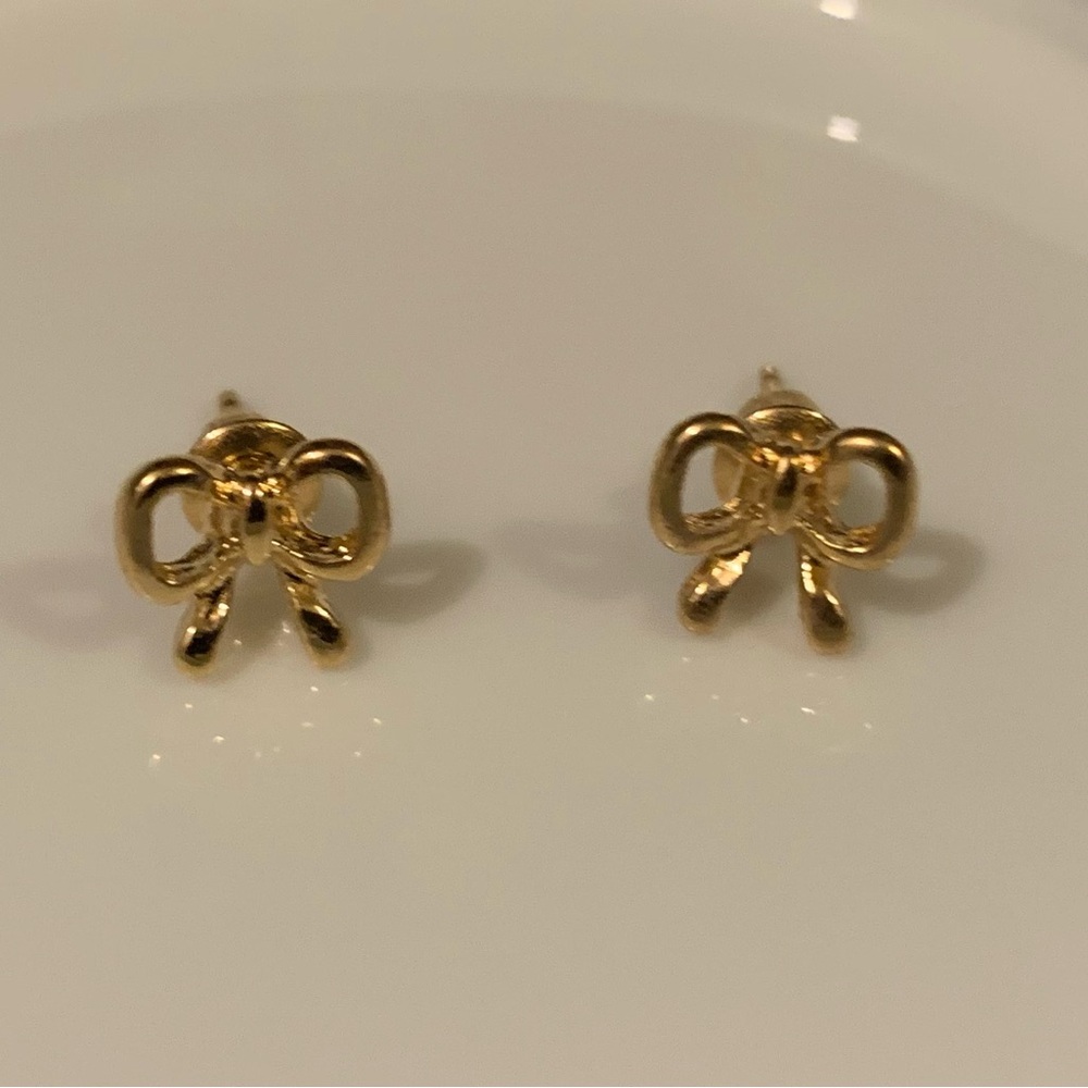 Delicate gold bow earrings